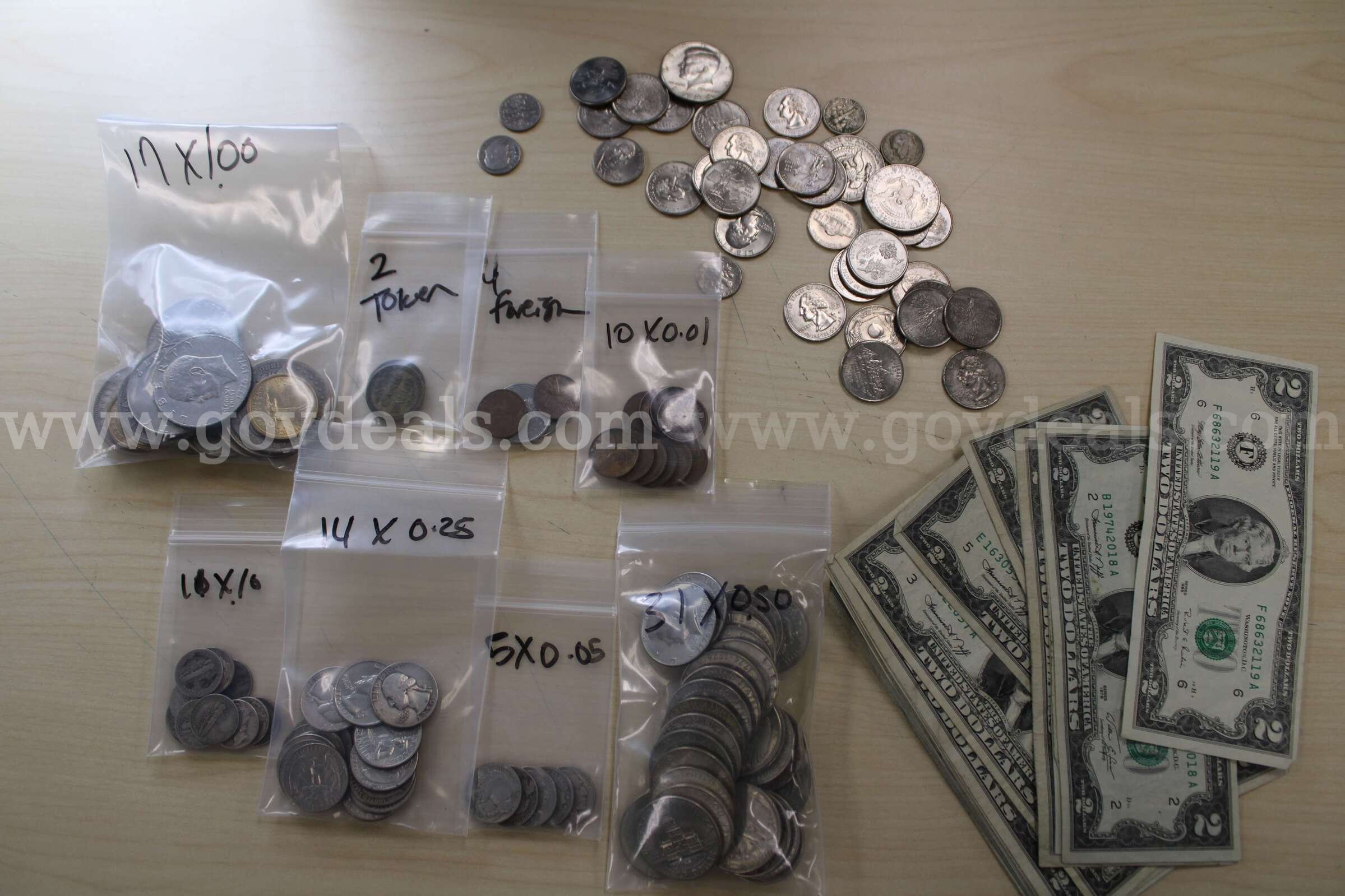 $2 BILL (16); $1 COIN (17); HALF $ (34); QUARTER (40); DIME (17); NICKEL (7);   Government Surplus Auction - Primary Photo