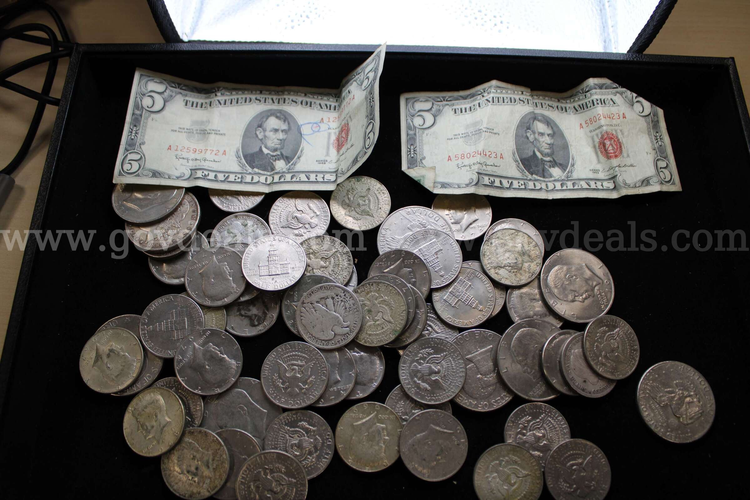 $5 BILL (2); $1 COIN (10); HALF DOLLAR (50)   Government Surplus Auction - Primary Photo