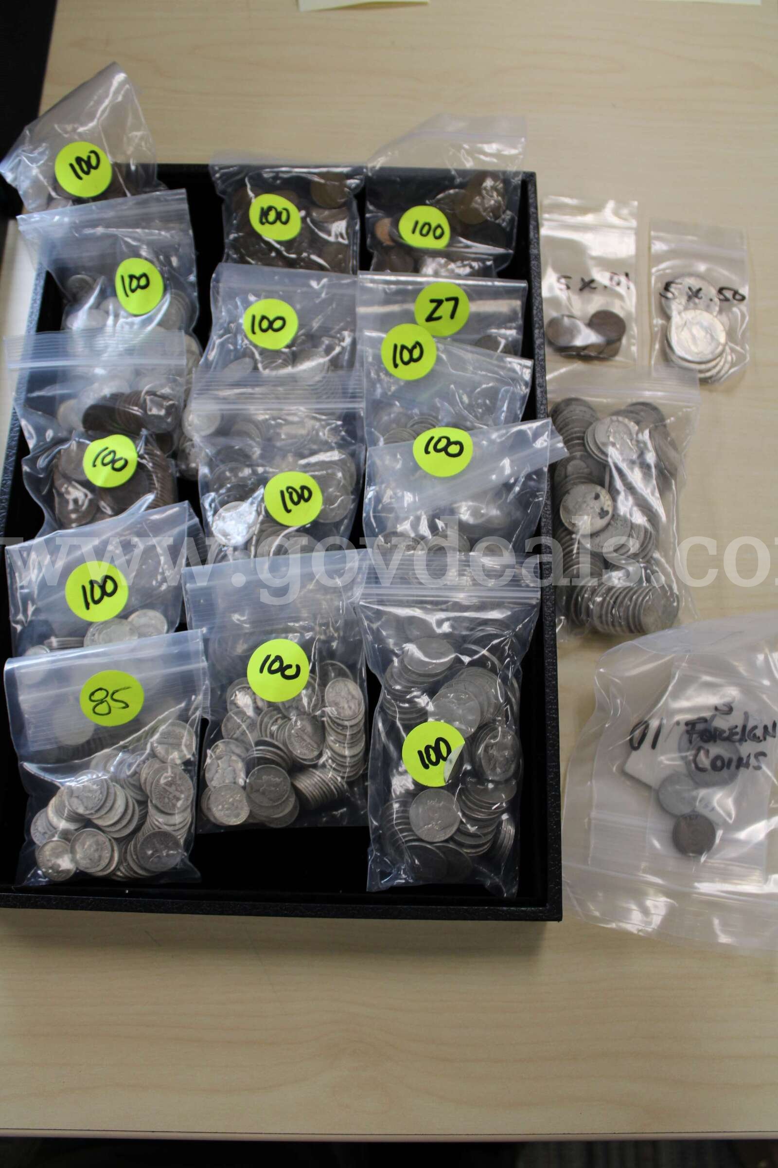 PENNY (405); HALF $ (5); DIMES (682); NICKELS (227); QUARTERS (88); FOREIGN COIN  405 Government Surplus Auction - Primary Photo