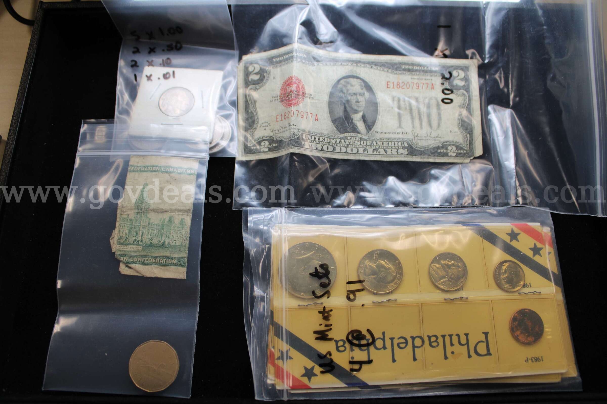 $2 BILL (1); MINTS SET (4); FOREIGN BILL (1) COIN (1); $1 COIN (5); HALF $ (2);   Government Surplus Auction - Primary Photo