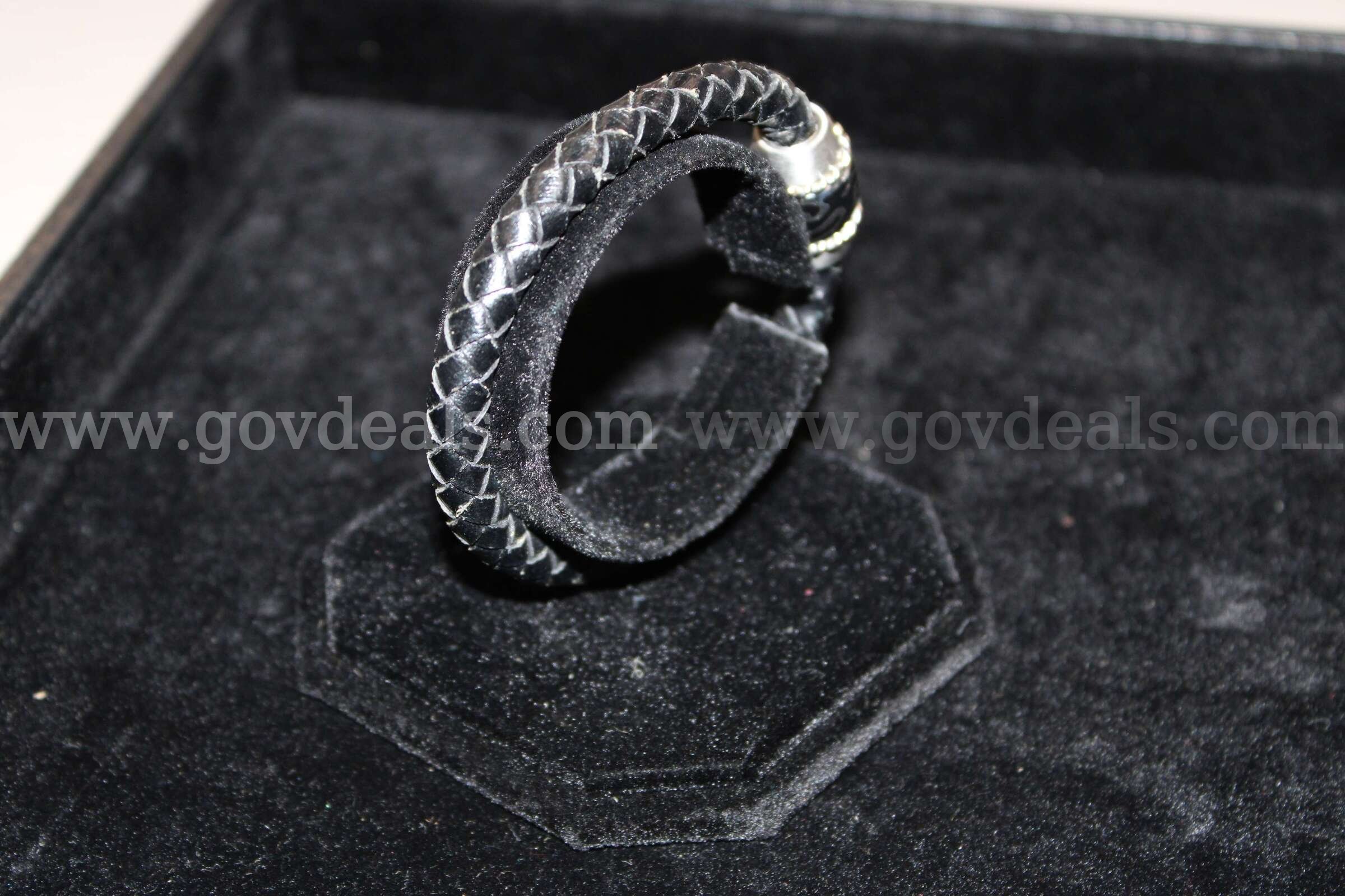 BLACK BRACELET   Government Surplus Auction - Primary Photo