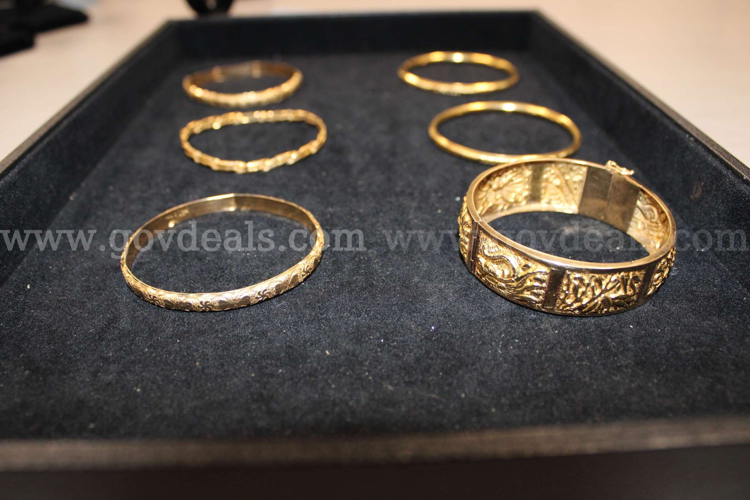 6 Bracelets   Government Surplus Auction - Primary Photo