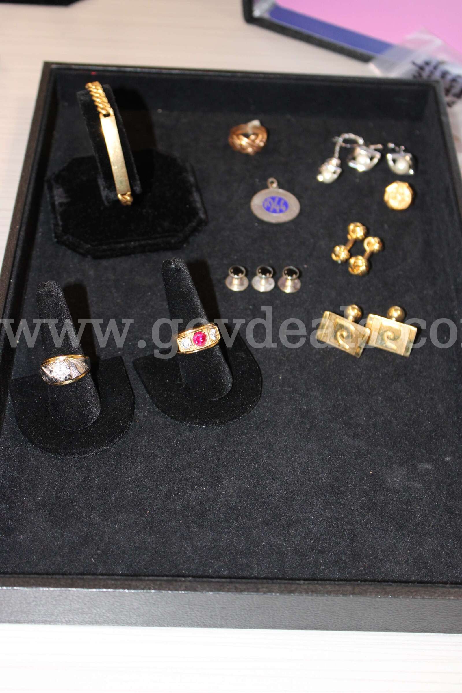 Watch (1)    Ring (3)     Bracelet (1)    Cuff Link Pair (3)  Tie (1)   Charm (1   Government Surplus Auction - Photo #2