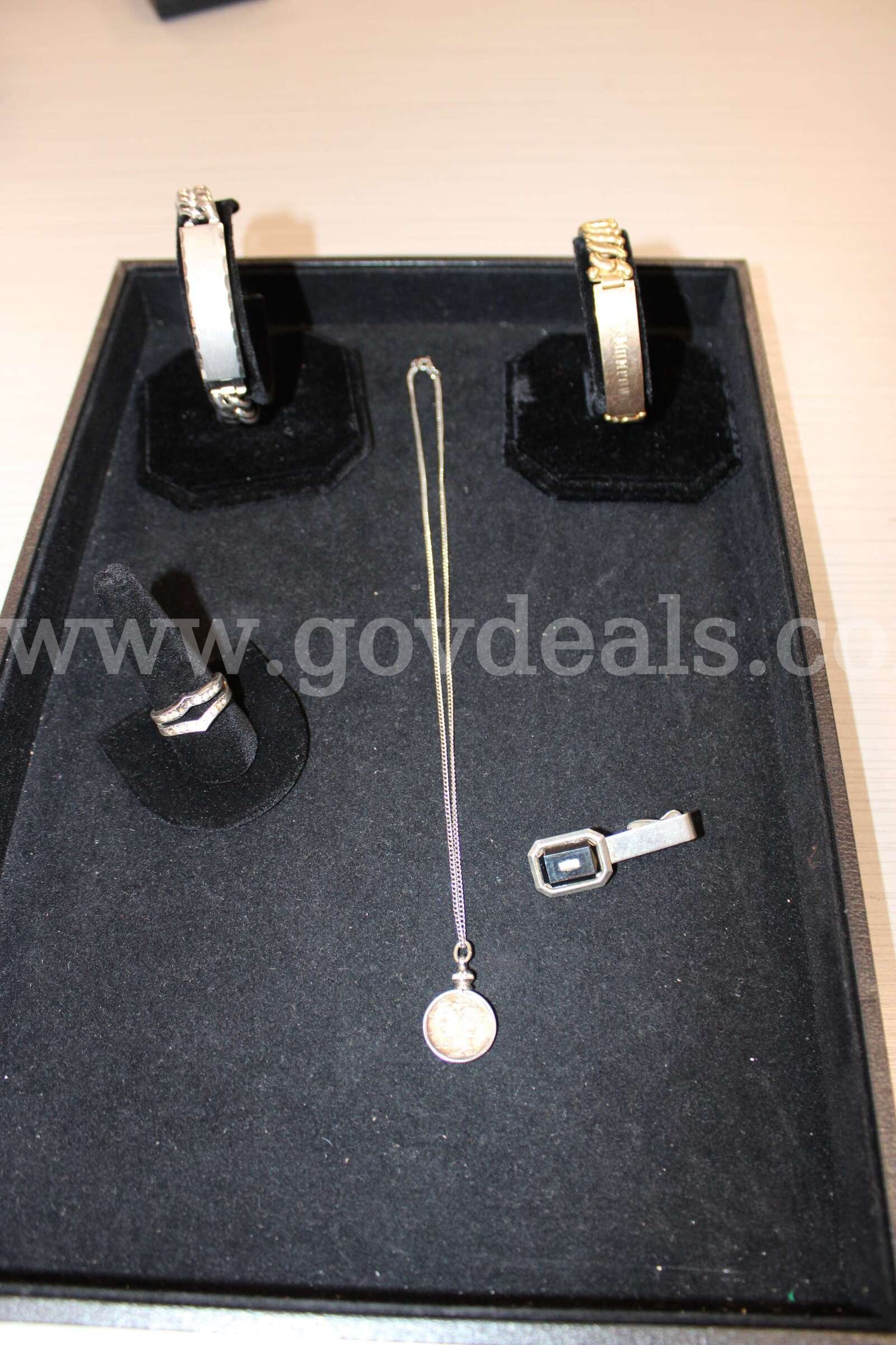 RING (1); TIE TAC (1); BRACELET (2); NECKLACE (1)   Government Surplus Auction - Primary Photo