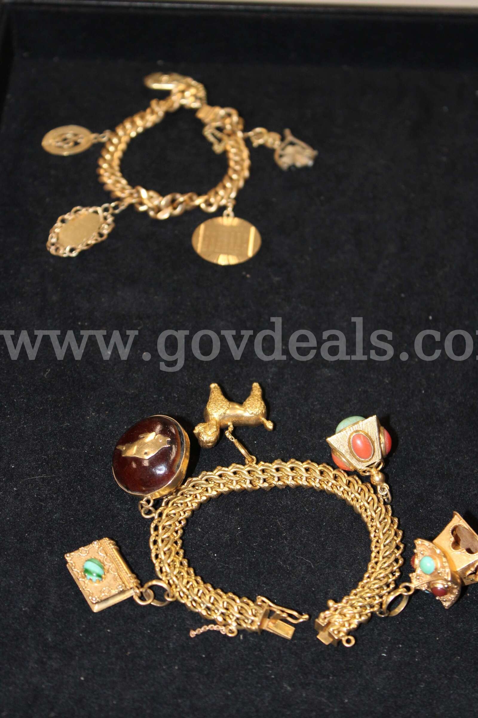 2 Bracelets   Government Surplus Auction - Primary Photo