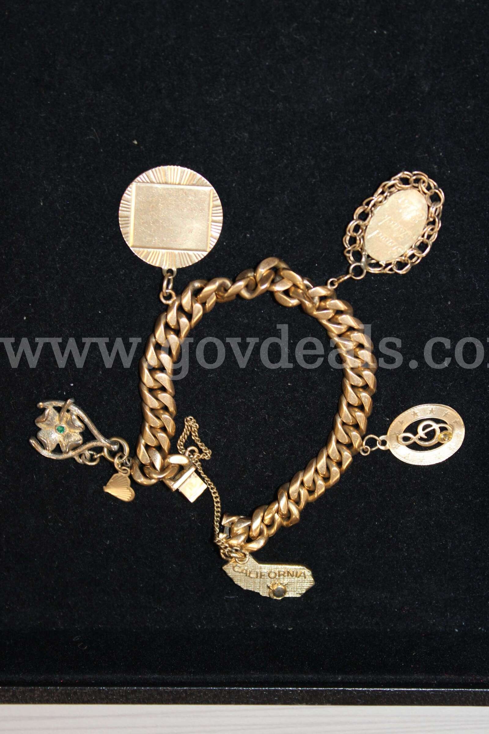 2 Bracelets   Government Surplus Auction - Photo #2