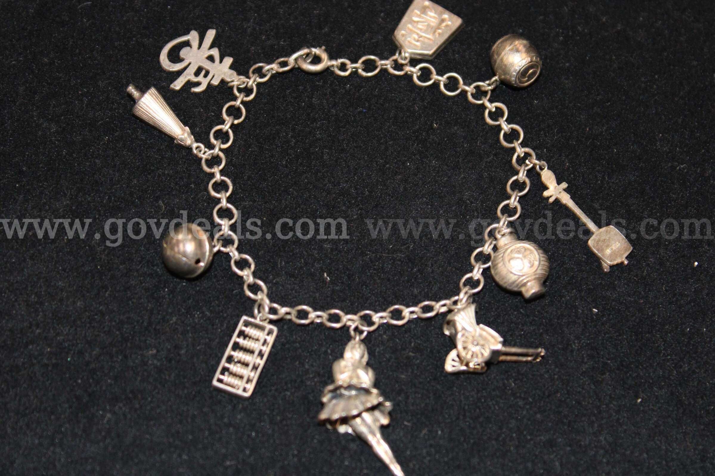 EARRING, PAIR (1); NECKLACE (2); BRACELET (2); RING (2); CUFF LINK PAIR (1); KEY   Government Surplus Auction - Photo #5