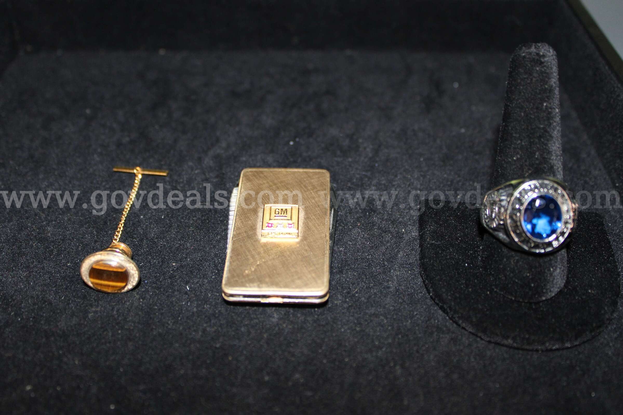 Ring (1)  Money Clip (1)  Tie Tack (2)   Government Surplus Auction - Primary Photo