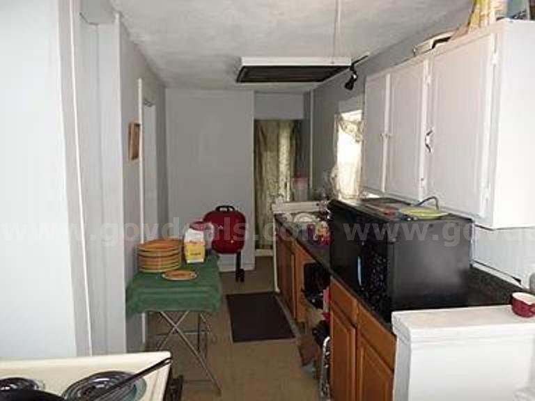 High-Potential Single-Family Fixer in Cahokia Heights – Affordable Investment Minutes from Downtown St. Louis   Government Surplus Auction - Photo #2
