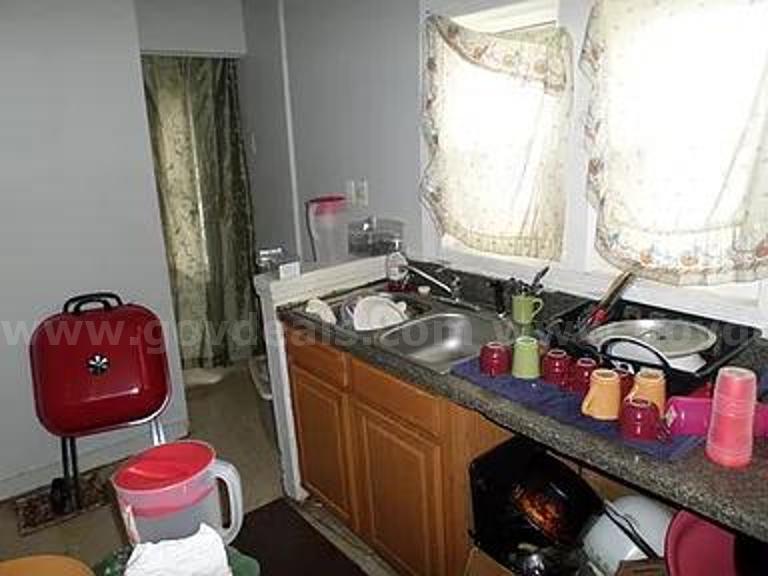 High-Potential Single-Family Fixer in Cahokia Heights – Affordable Investment Minutes from Downtown St. Louis   Government Surplus Auction - Photo #3