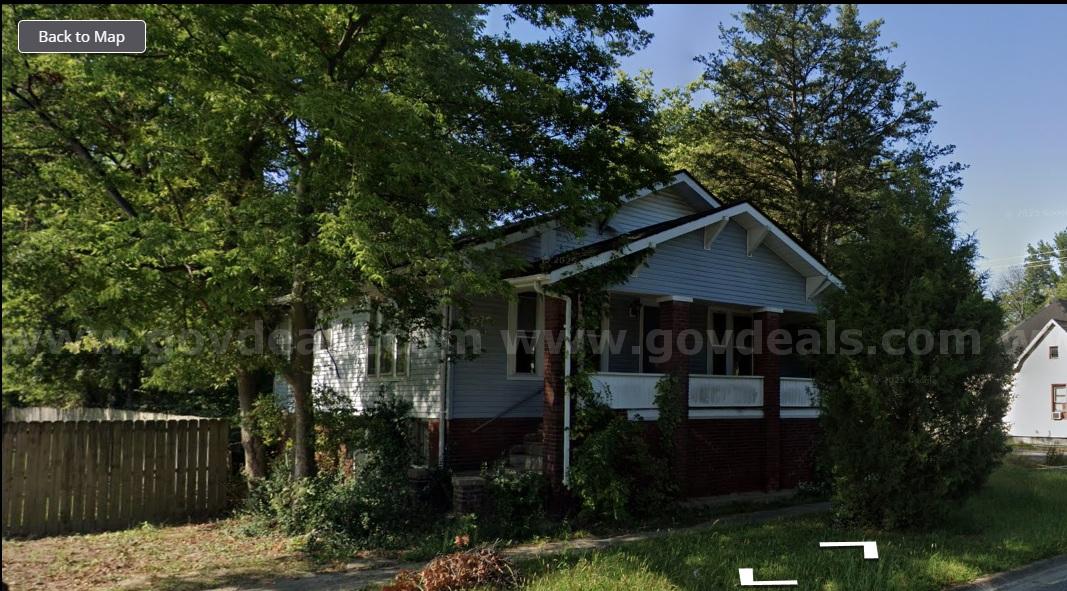Budget-Friendly Single-Family Fixer in Harrisburg IL – Strong Rental Market with Solid Upside Potential   Government Surplus Auction - Primary Photo