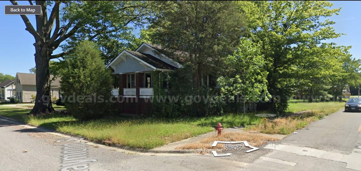 Budget-Friendly Single-Family Fixer in Harrisburg IL – Strong Rental Market with Solid Upside Potential   Government Surplus Auction - Photo #2