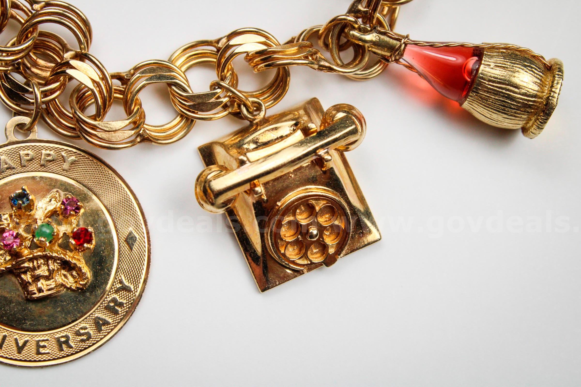 Gold Charm Bracelet and Charms   Government Surplus Auction - Photo #2