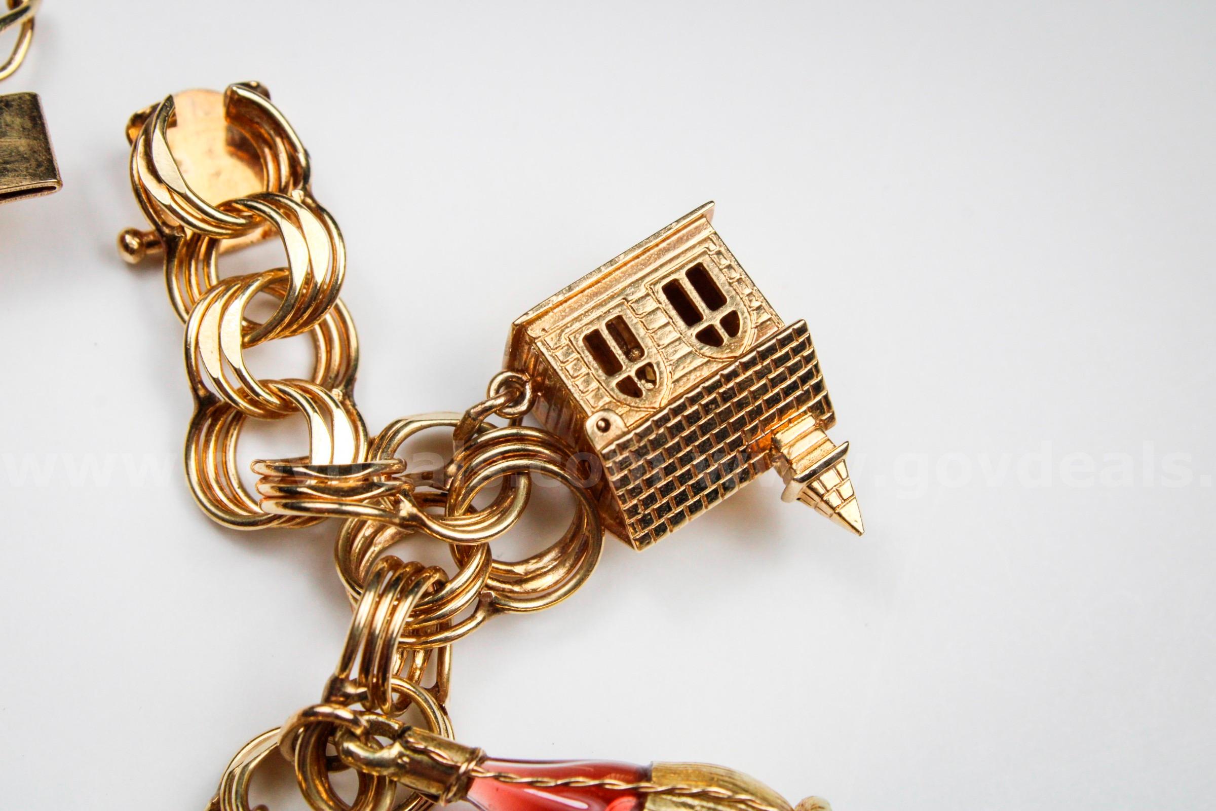 Gold Charm Bracelet and Charms   Government Surplus Auction - Photo #3