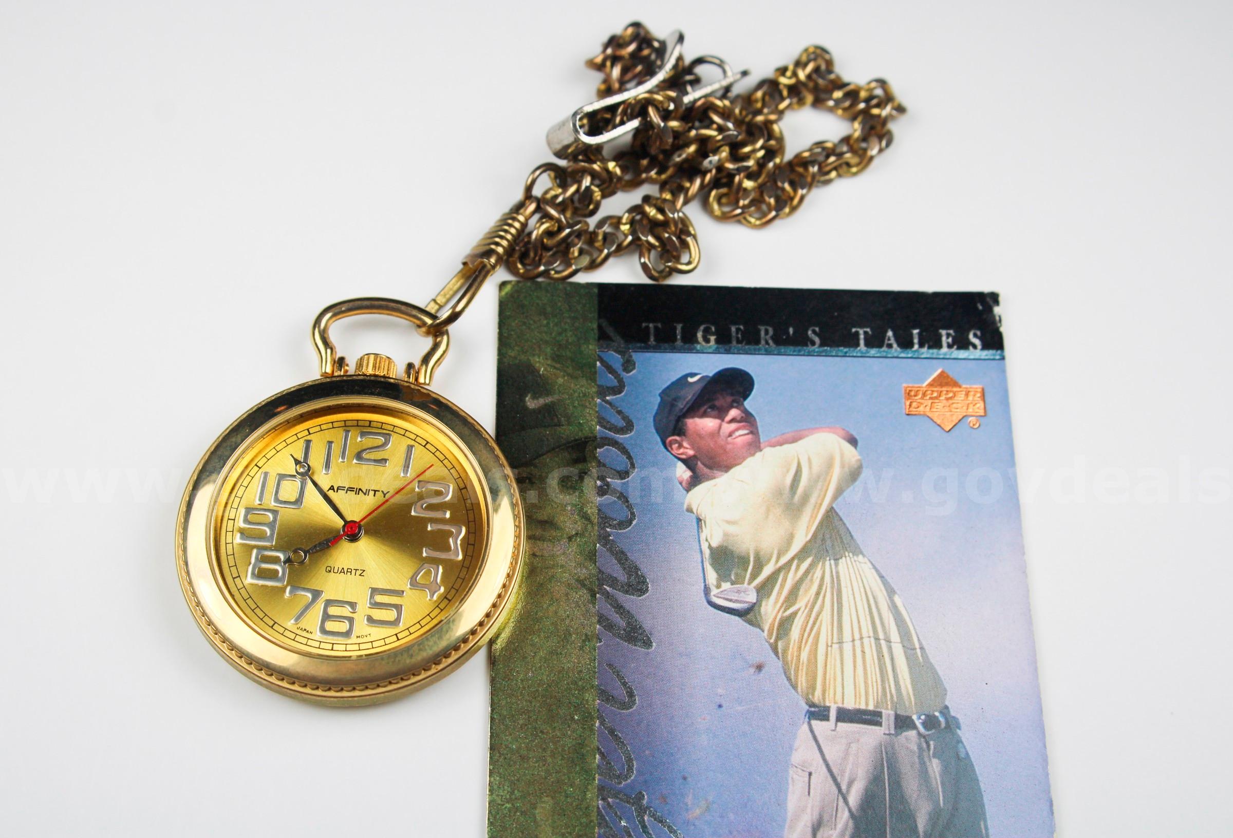 Affinity Quartz Watch with Chain plus Tiger Woods 1997 Upper Deck Card   Government Surplus Auction - Primary Photo