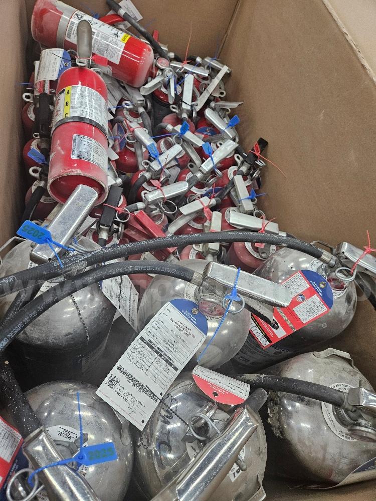 Fire Extinguishers various sizes and colors for auction. Sold As Is. Total 75.   Government Surplus Auction - Primary Photo