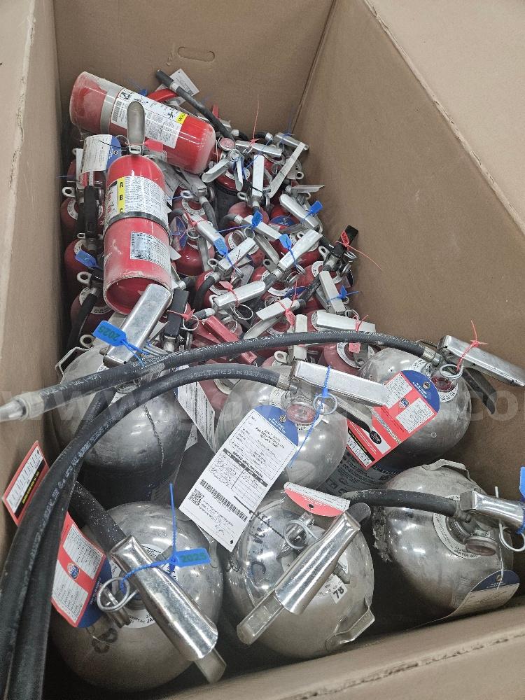 Fire Extinguishers various sizes and colors for auction. Sold As Is. Total 75.   Government Surplus Auction - Photo #2