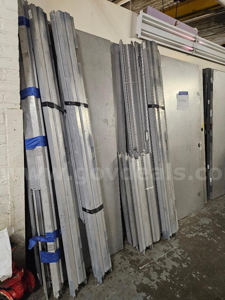 20 Metal Doors and 8 Stack of Metal Door Bucks. Sold As Is.   Government Surplus Auction - Photo #2