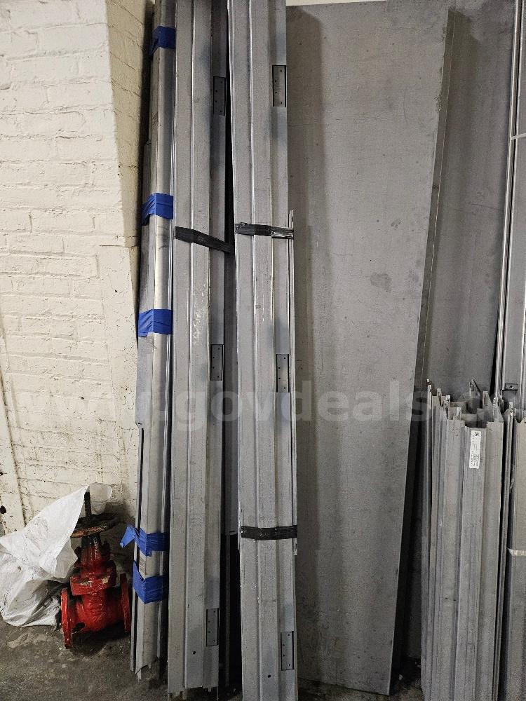 20 Metal Doors and 8 Stack of Metal Door Bucks. Sold As Is.   Government Surplus Auction - Photo #3