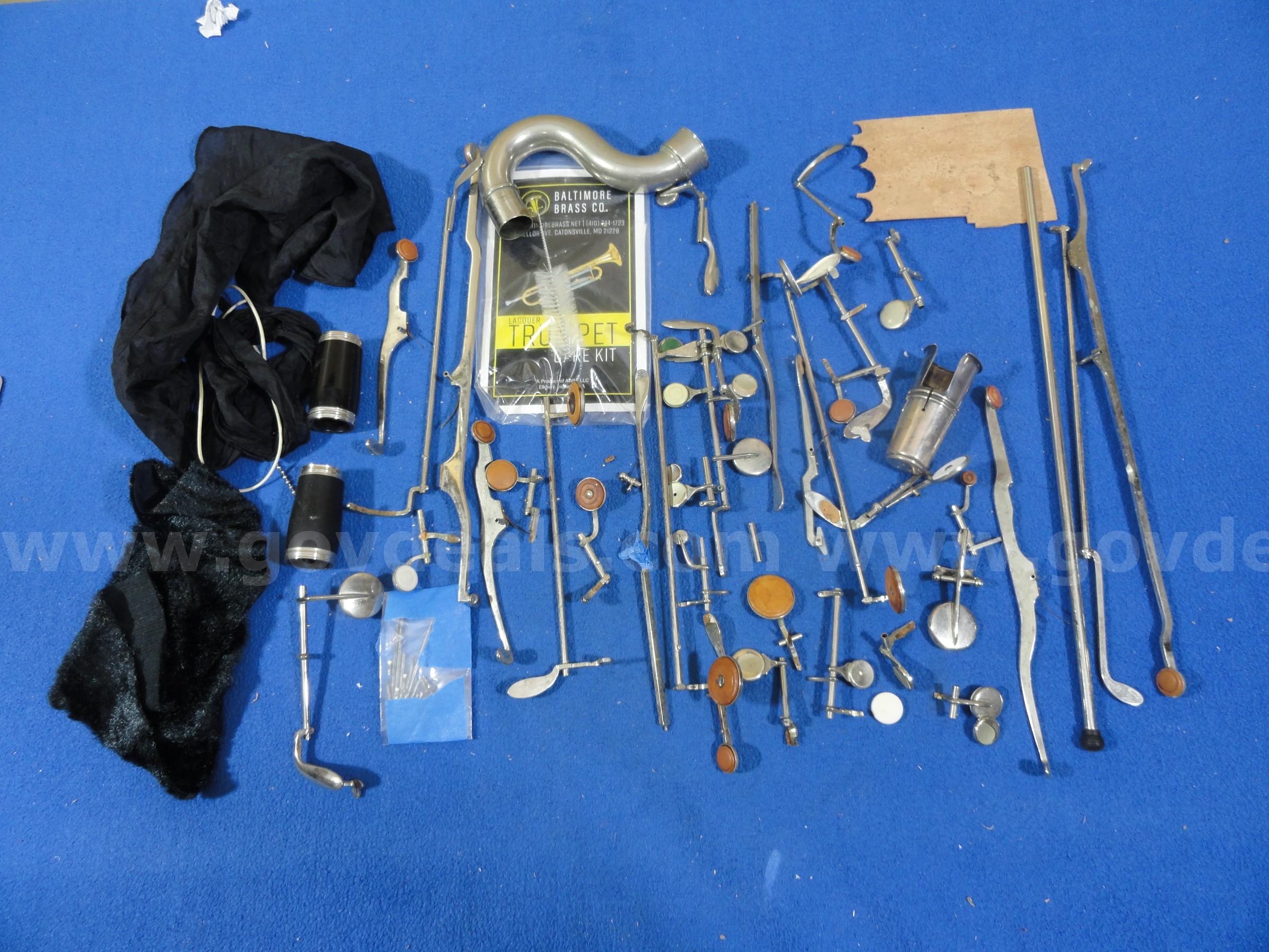 Large Lot of Bass Clarinet Parts, Valves, Slides, Care Kit, etc.   Government Surplus Auction - Primary Photo