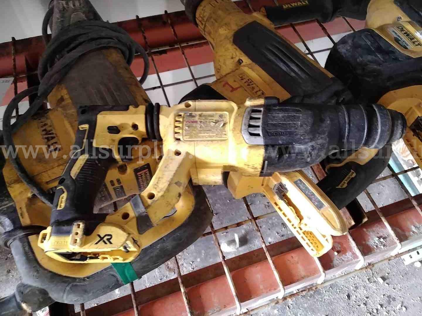 Power Tools, Hammer  Drill, Rivet Buster, Drive Motor, Cement Saw, Band Saw, Angle Grinder, W/ 20ft Connex   Government Surplus Auction - Primary Photo