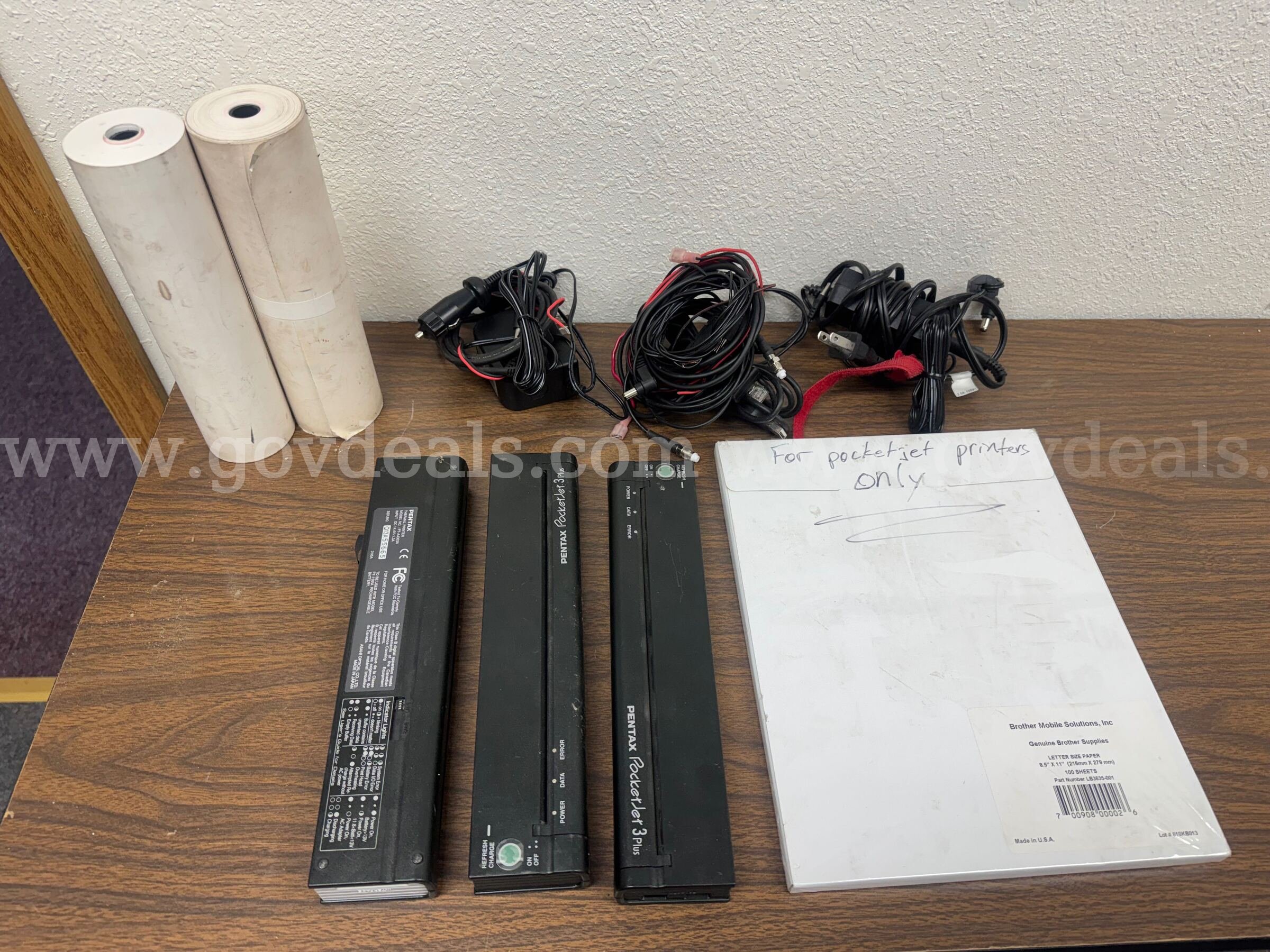 Pentax PocketJet 3 Plus Portable Thermal Printer Lot – 3 Printers, Battery, Cables & Paper   Government Surplus Auction - Primary Photo