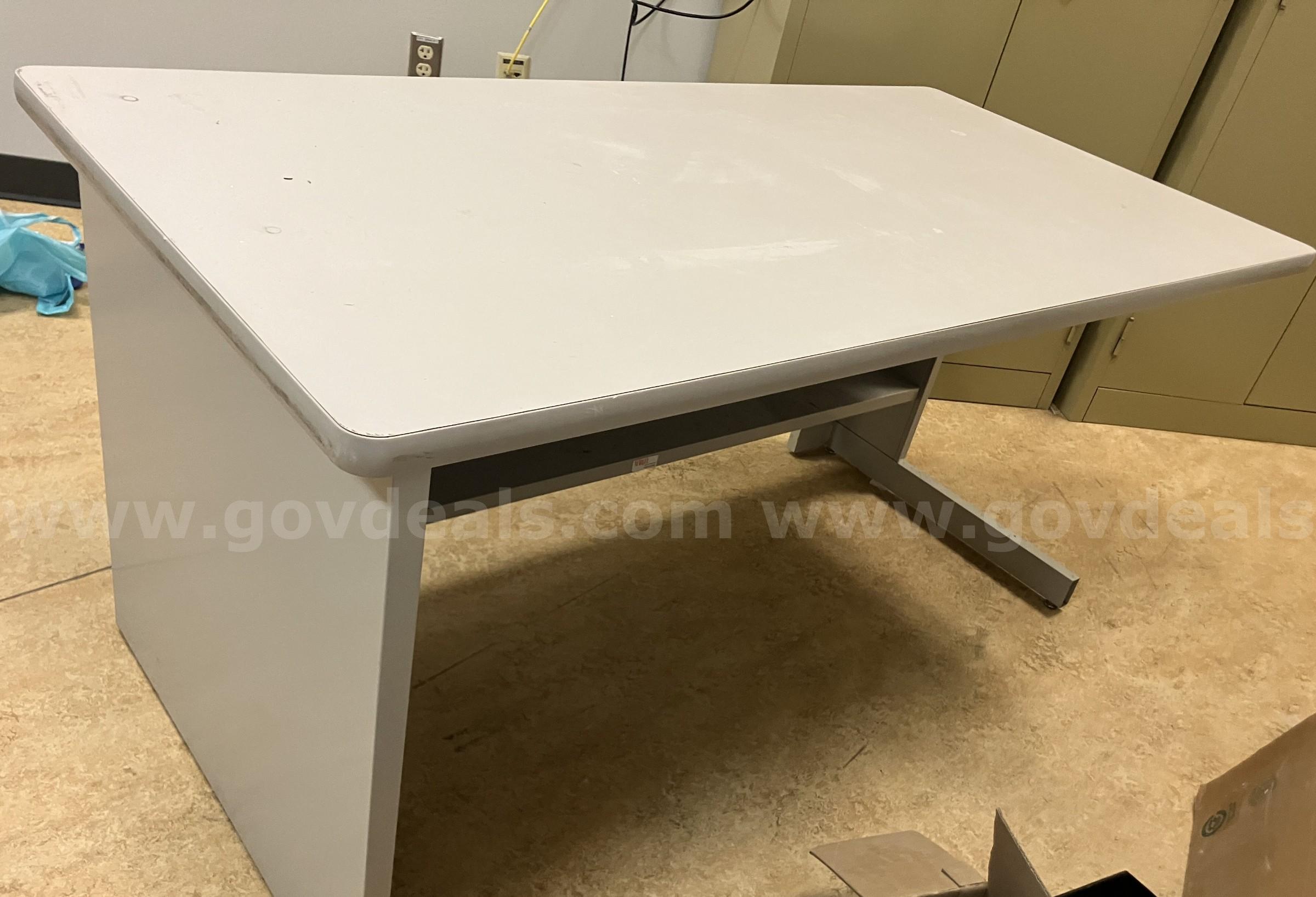 Gray metal office desk for sale (60" w x 30" d x 30" h)   Government Surplus Auction - Primary Photo