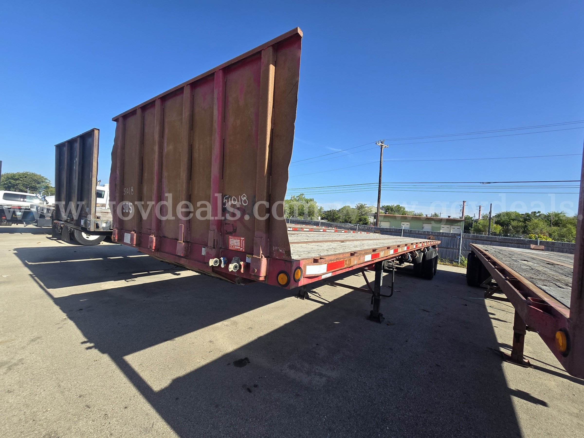 2006 Clark CFBT2006 T/A Flatbed Trailer Clark CFBT2006 Government Surplus Auction - Primary Photo
