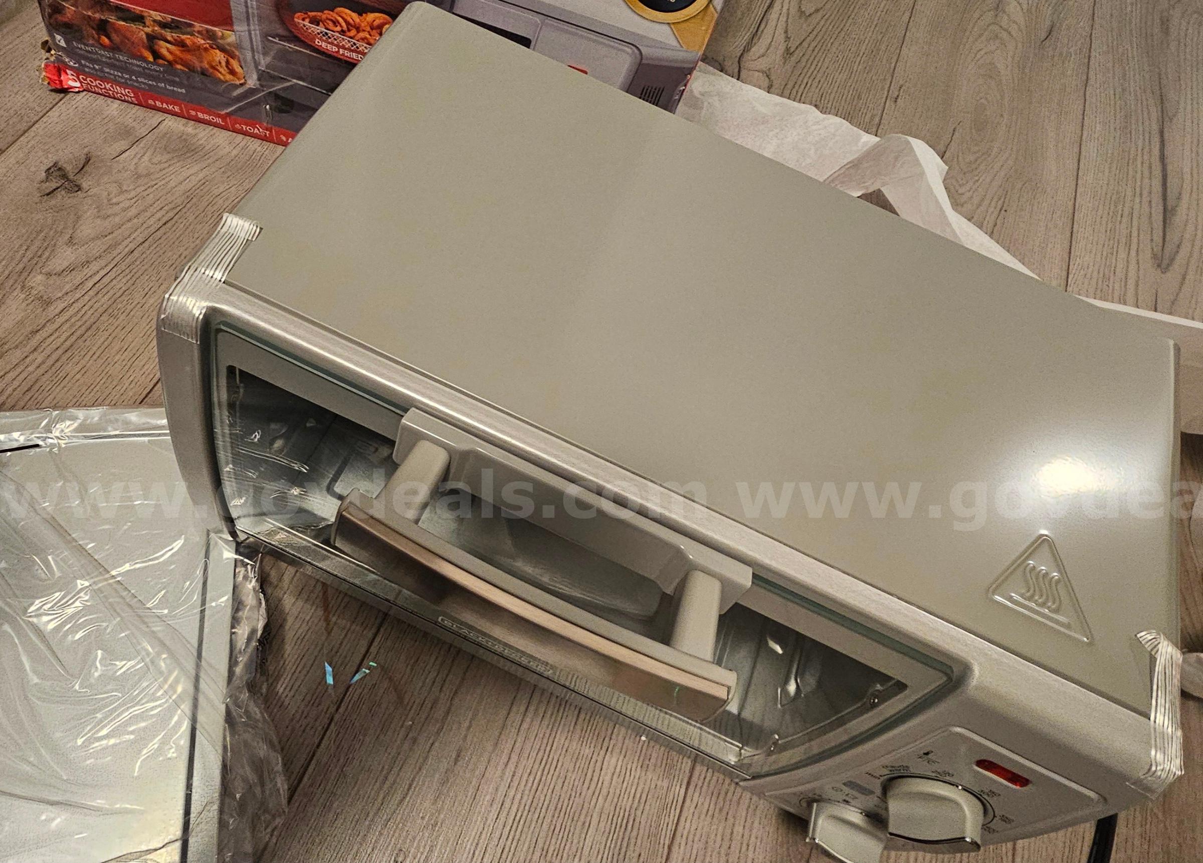 BLACK+DECKER 4-Slice Stainless Steel Toaster Oven (Silver) - NEW BLACk + DECKER  Government Surplus Auction - Photo #4