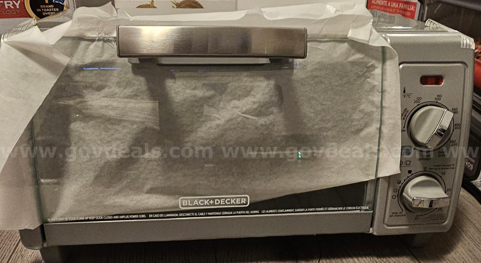 BLACK+DECKER 4-Slice Stainless Steel Toaster Oven (Silver) - NEW BLACk + DECKER  Government Surplus Auction - Photo #3