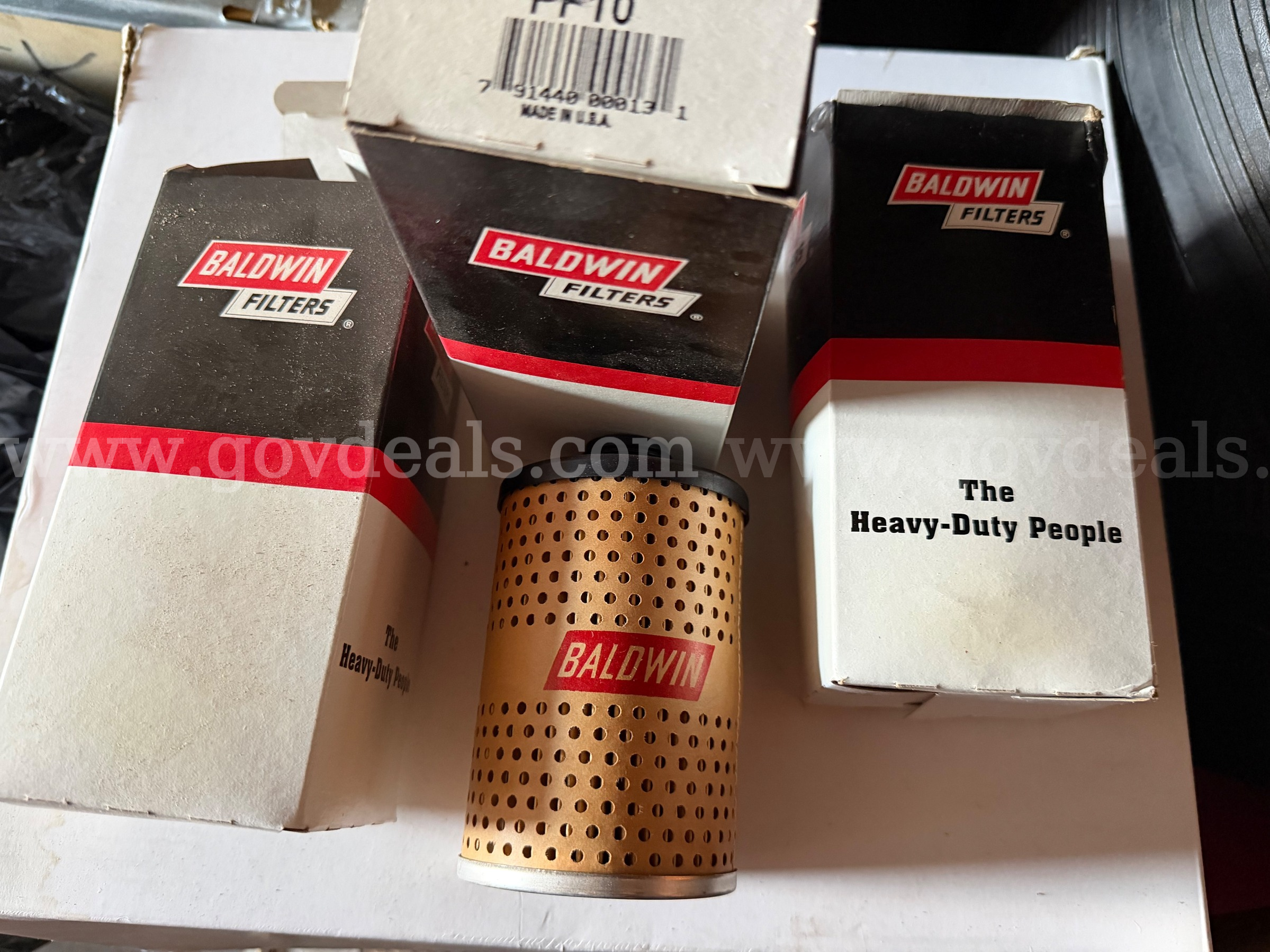 LOT OF 3 Baldwin Filters Pf10 Fuel Filter 4-7/8 X 3 X 4-7/8 In MADE IN USA *WILL SHIP*   Government Surplus Auction - Primary Photo
