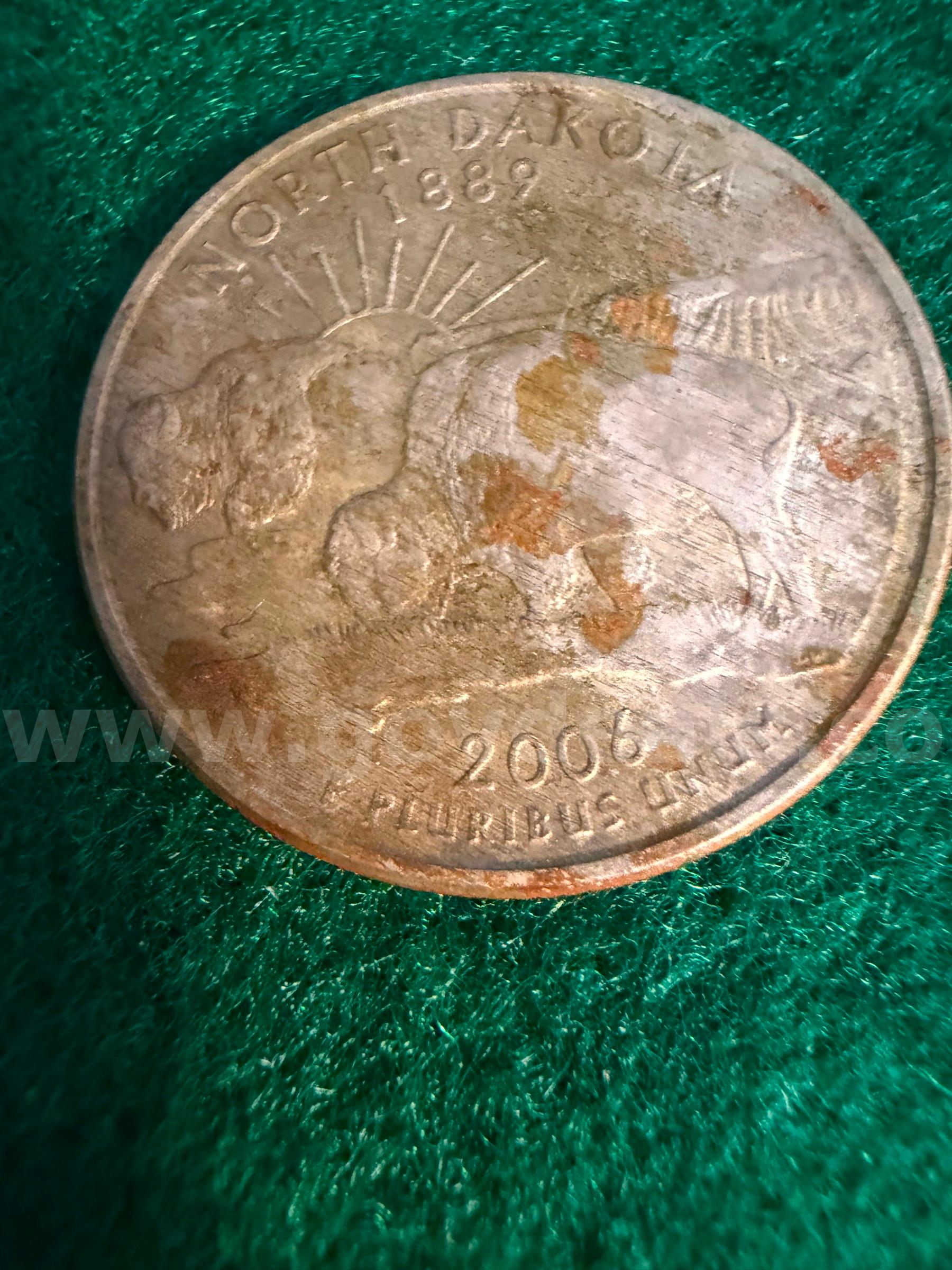 Unusual 2006 D Quarter with REVERSE Delamination   Government Surplus Auction - Primary Photo