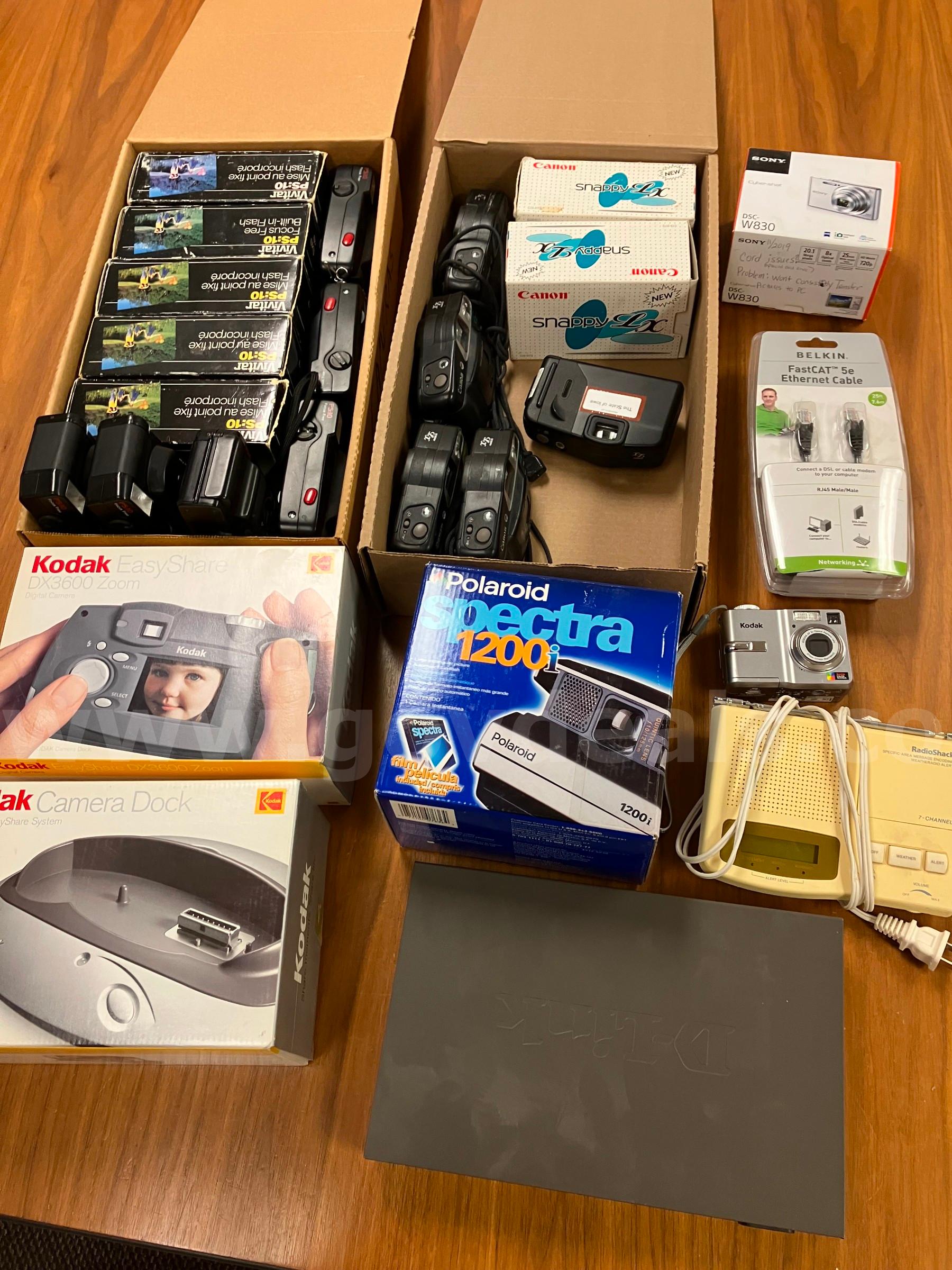 Kodak, Sony, Vivitar and Canon Cameras and Misc. Items