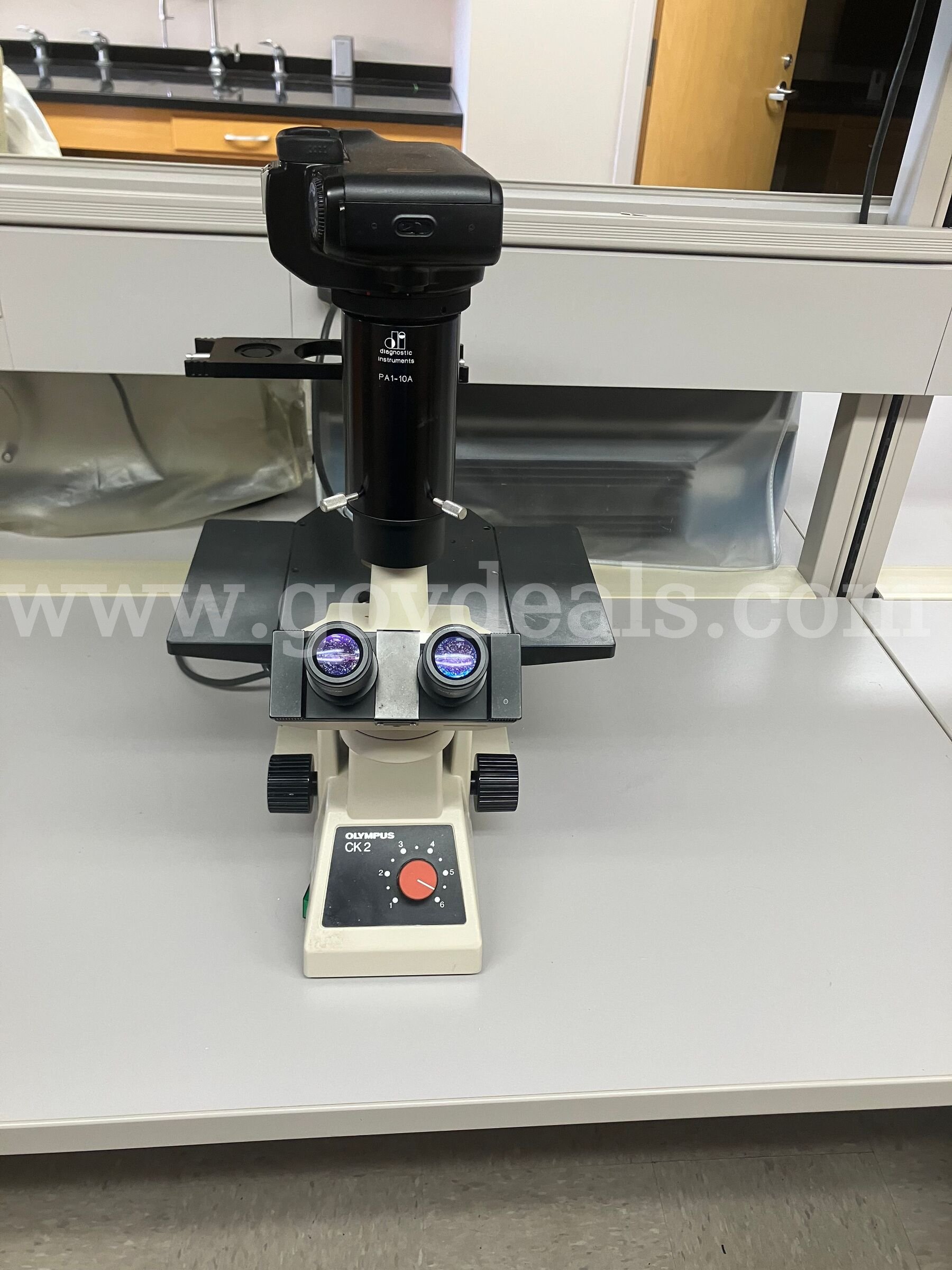 Olympus CKZ ULWCD 0.30 used with a Diagnostic Instruments PA1-10A Olympus CKZ ULWCD 0.30 Government Surplus Auction - Primary Photo