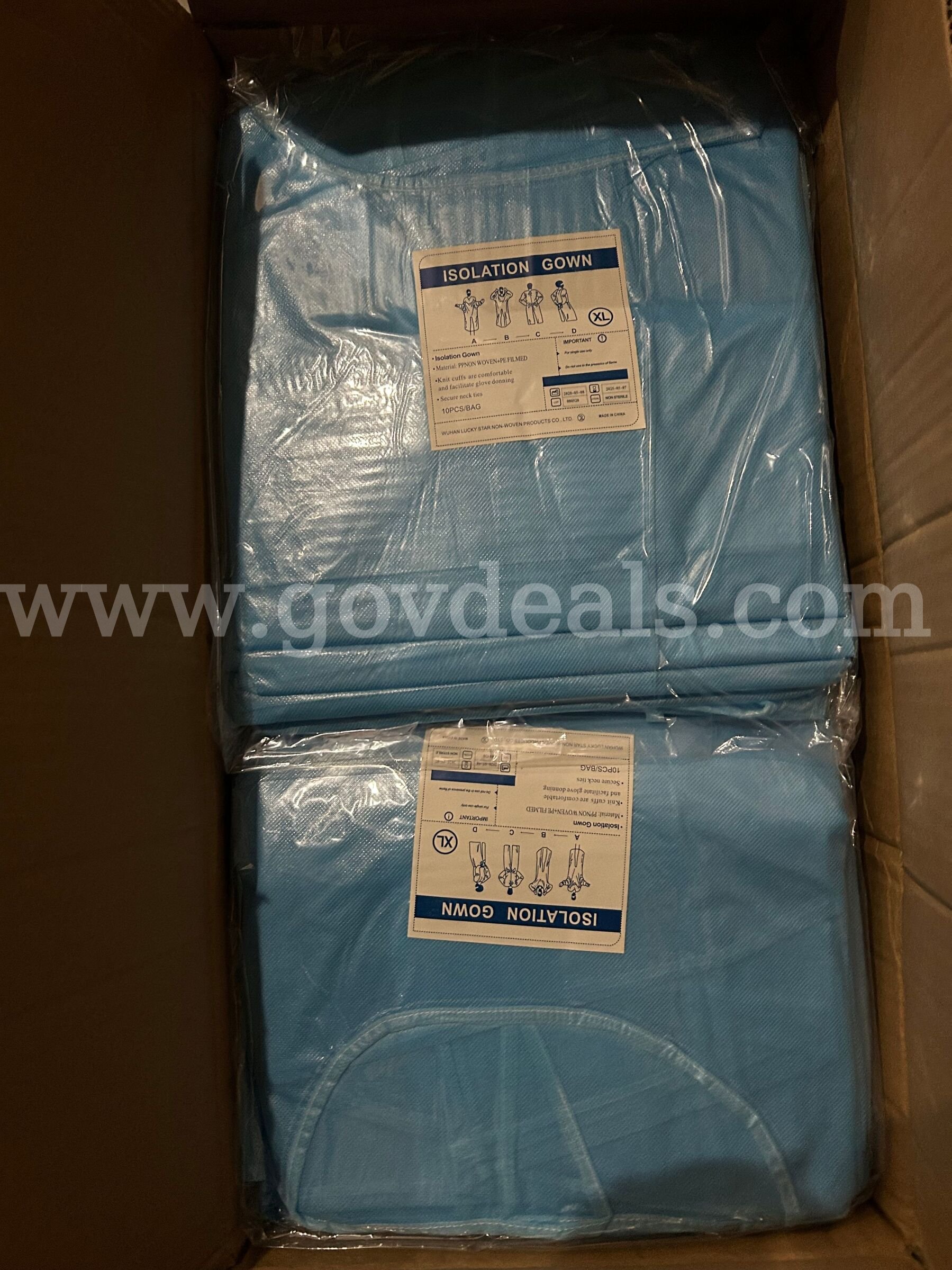 5 Pallets of Disposable Gowns Knit Cuffs and Secure Neck ties 18 per pallet Size XL   Government Surplus Auction - Photo #3