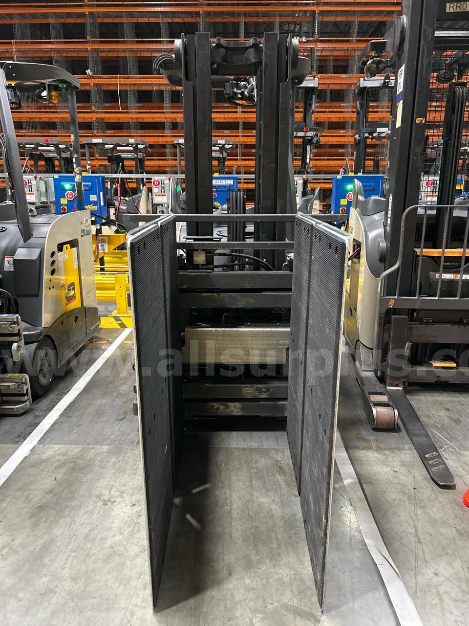 Crown RC 5500 Series Stand-Up Electric Forklift with Carton Clamp Crown 5500 Government Surplus Auction - Photo #4
