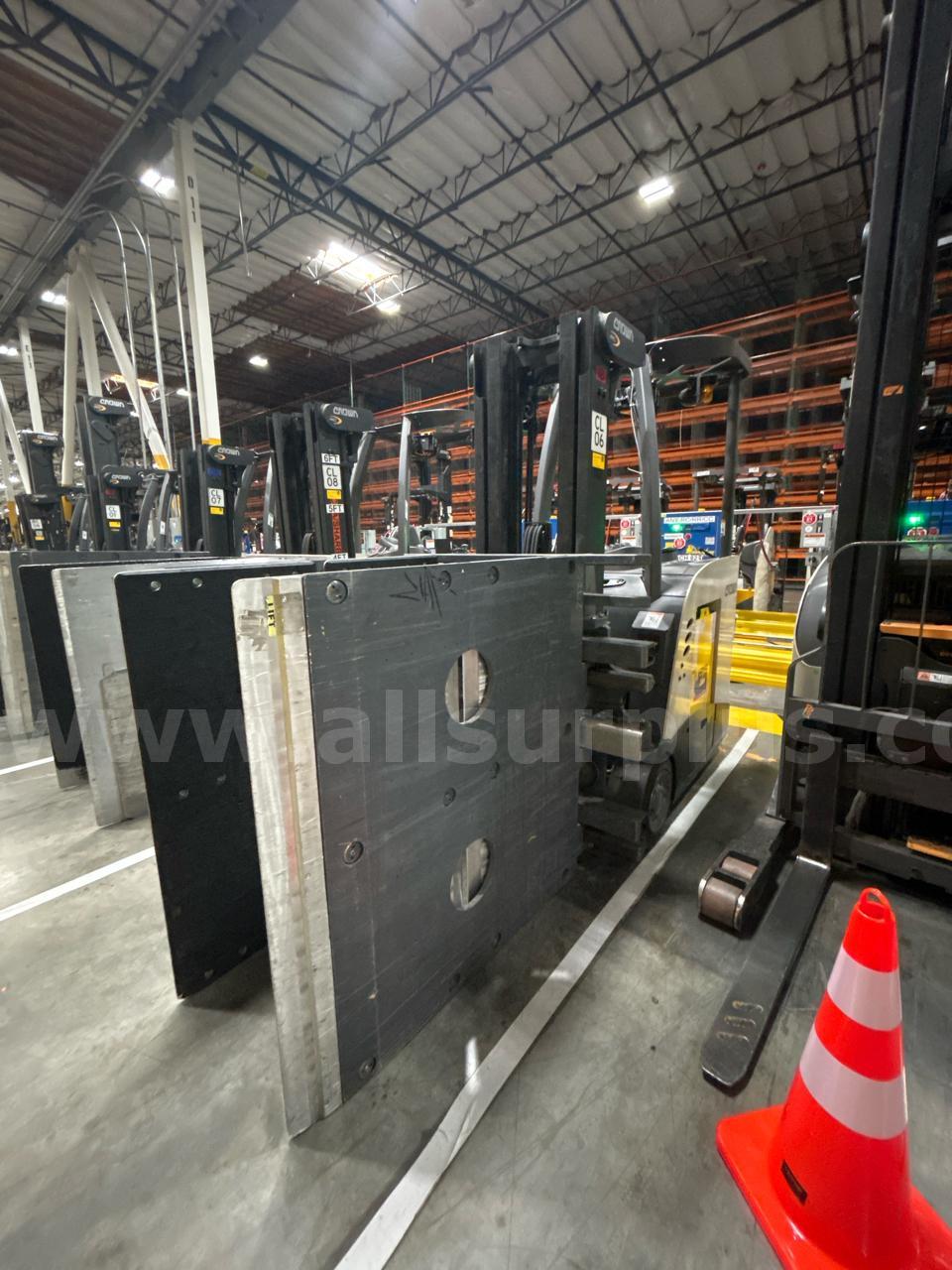 Crown RC 5500 Series Stand-Up Electric Forklift with Carton Clamp Crown 5500 Government Surplus Auction - Photo #5