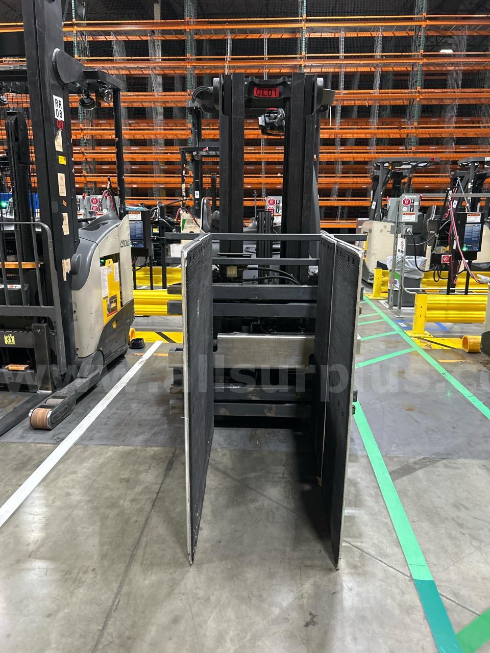 Crown RC 5500 Series Stand-Up Electric Forklift with Carton Clamp Crown 5500 Government Surplus Auction - Photo #4