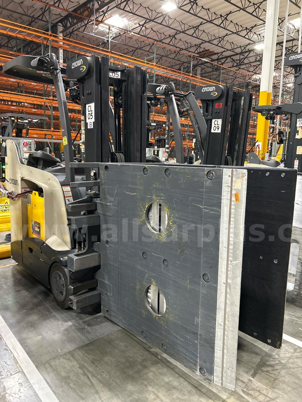 Crown RC 5500 Series Stand-Up Electric Forklift with Carton Clamp Crown 5500 Government Surplus Auction - Photo #6