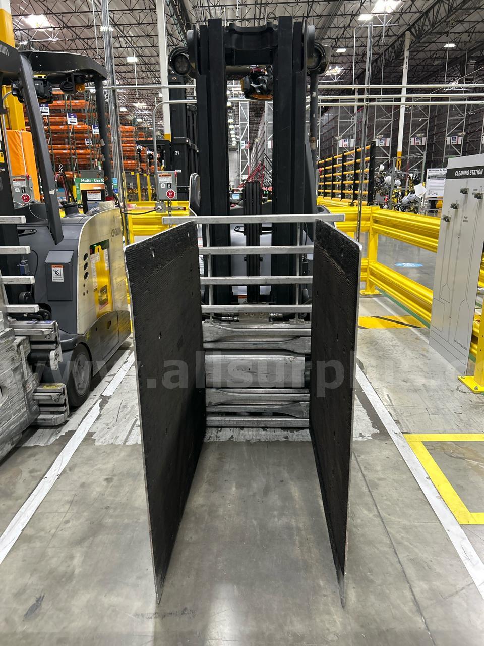 Crown RC 5500 Series Stand-Up Electric Forklift with Carton Clamp Crown 5500 Government Surplus Auction - Photo #4