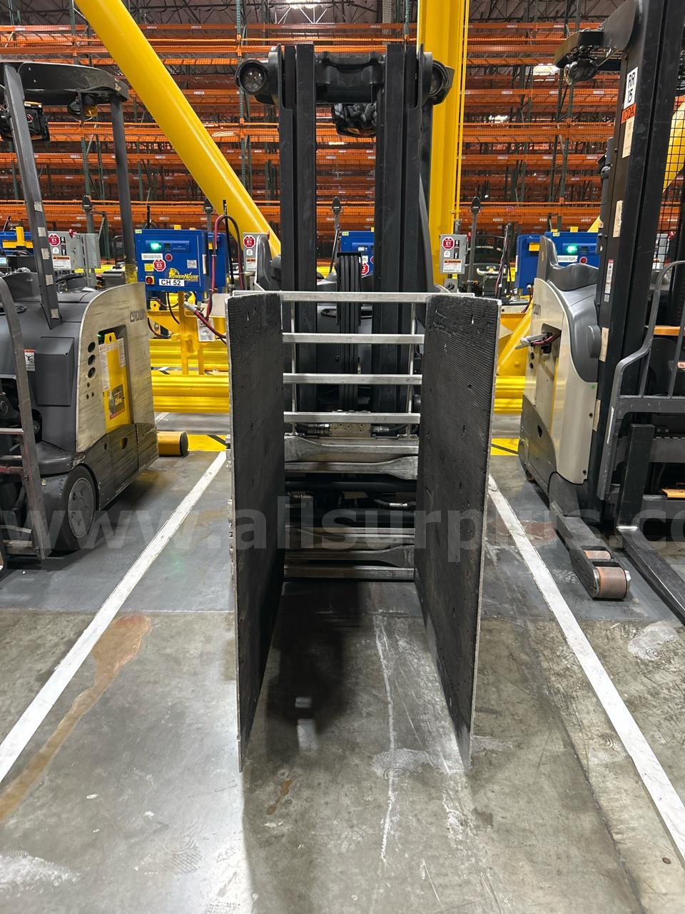 Crown RC 5500 Series Stand-Up Electric Forklift with Carton Clamp Crown 5500 Government Surplus Auction - Photo #3