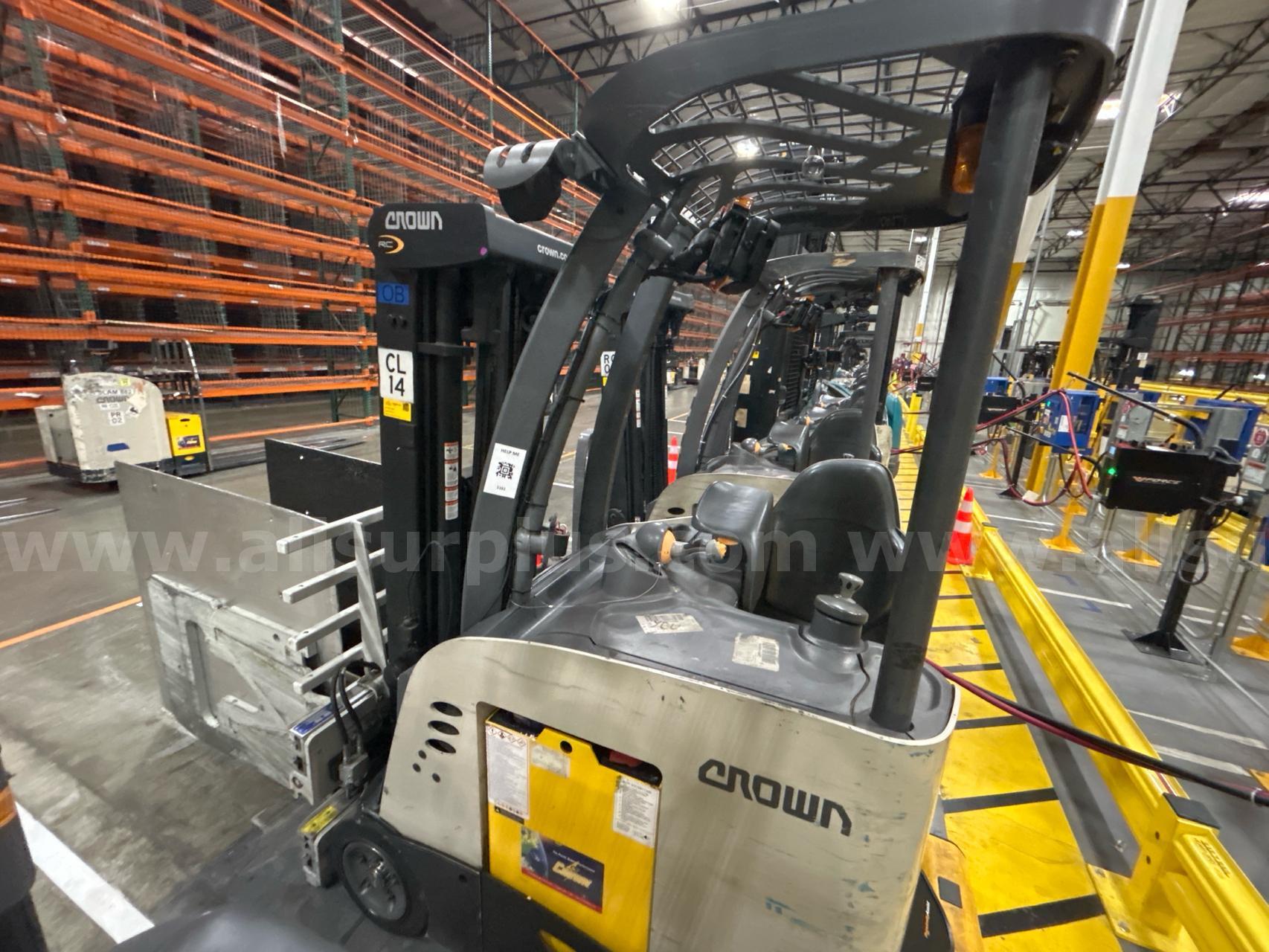 Crown RC 5500 Series Stand-Up Electric Forklift with Carton Clamp Crown 5500 Government Surplus Auction - Photo #5