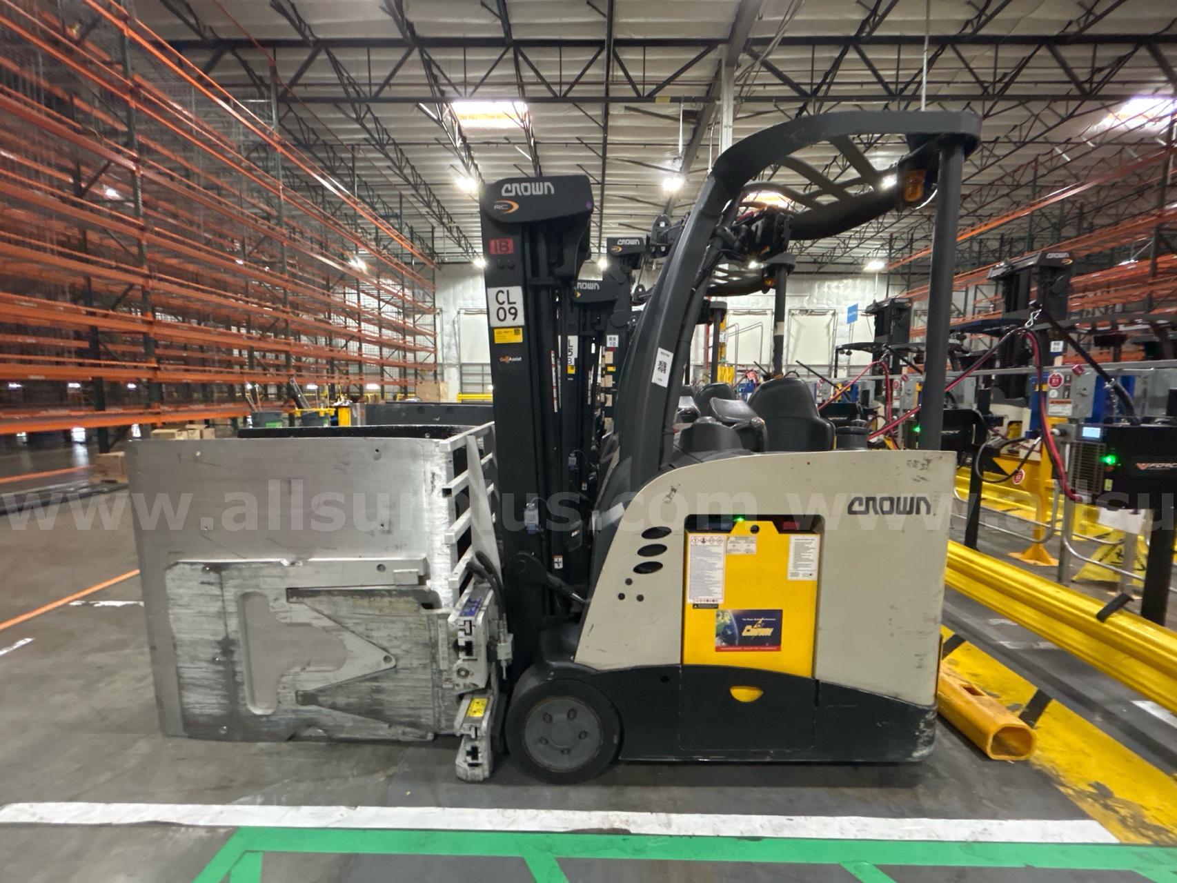 Crown RC 5500 Series Stand-Up Electric Forklift with Carton Clamp Crown 5500 Government Surplus Auction - Photo #4