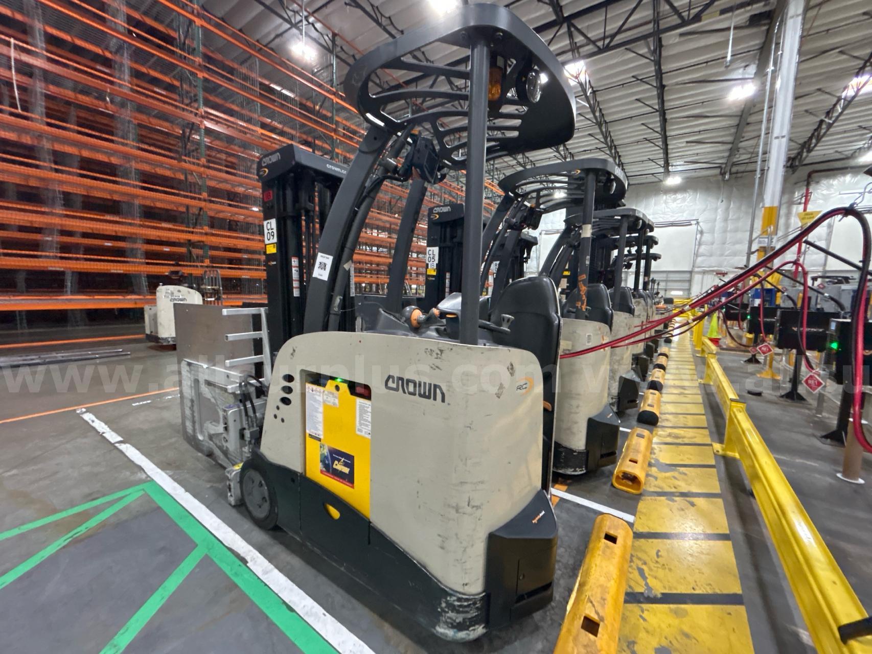 Crown RC 5500 Series Stand-Up Electric Forklift with Carton Clamp Crown 5500 Government Surplus Auction - Photo #5
