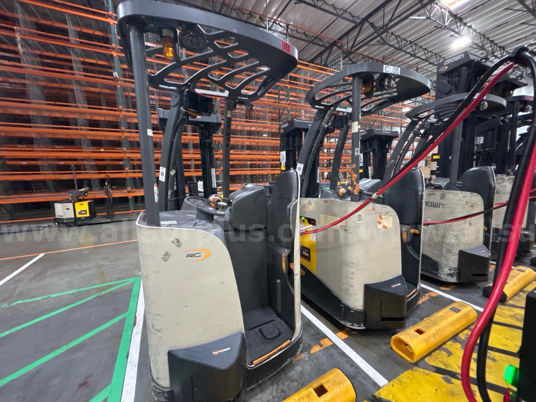 Crown RC 5500 Series Stand-Up Electric Forklift with Carton Clamp Crown 5500 Government Surplus Auction - Photo #6