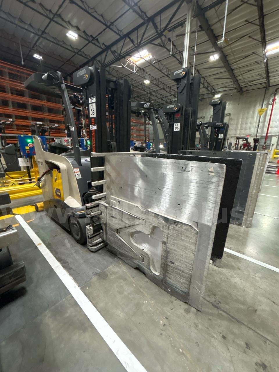 Crown RC 5500 Series Stand-Up Electric Forklift with Carton Clamp Crown 5500 Government Surplus Auction - Photo #2