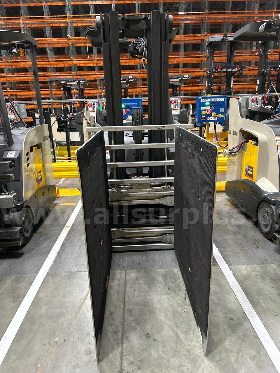 Crown RC 5500 Series Stand-Up Electric Forklift with Carton Clamp Crown 5500 Government Surplus Auction - Photo #4