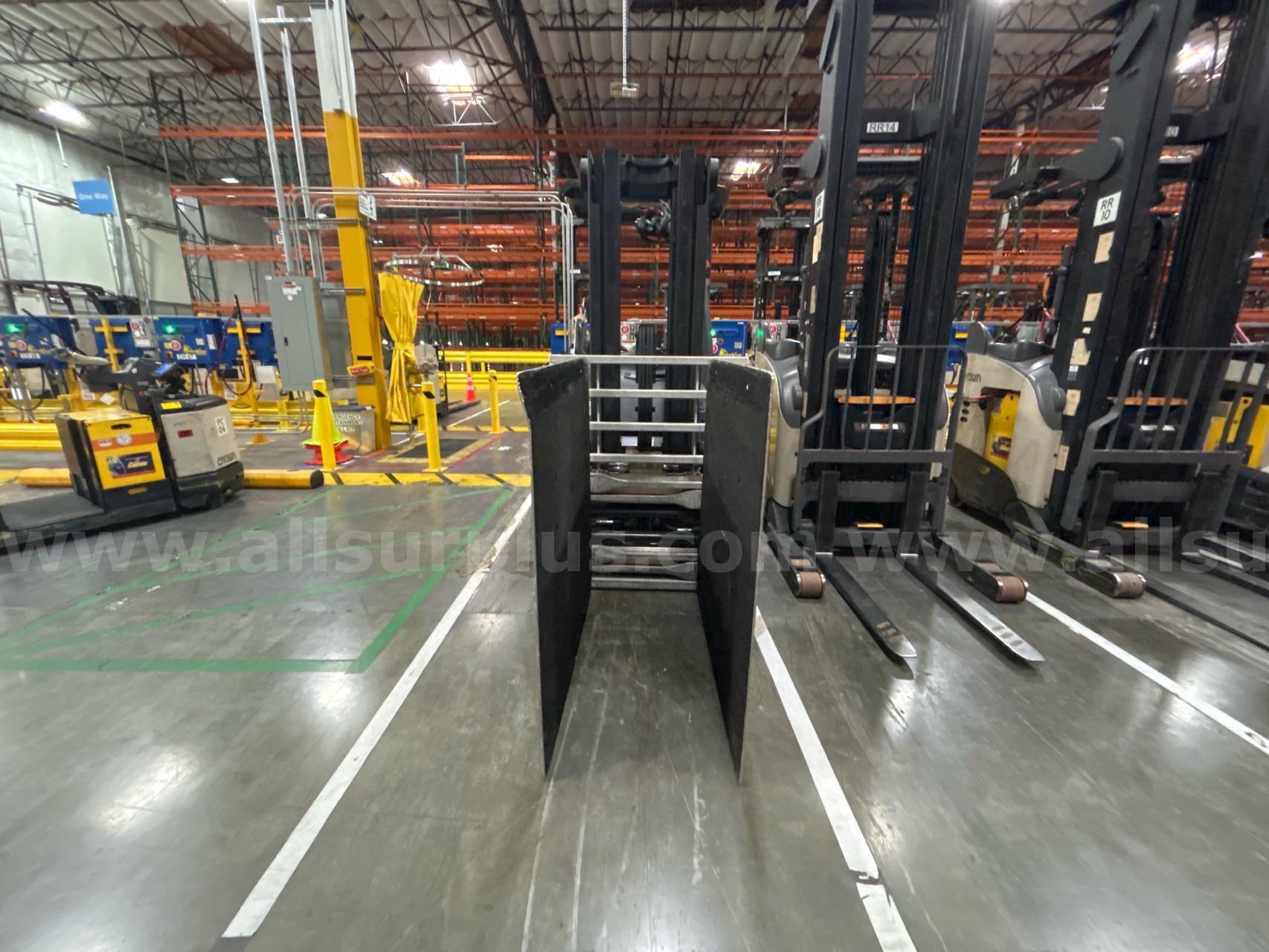 Crown RC 5500 Series Stand-Up Electric Forklift with Carton Clamp Crown 5500 Government Surplus Auction - Photo #4