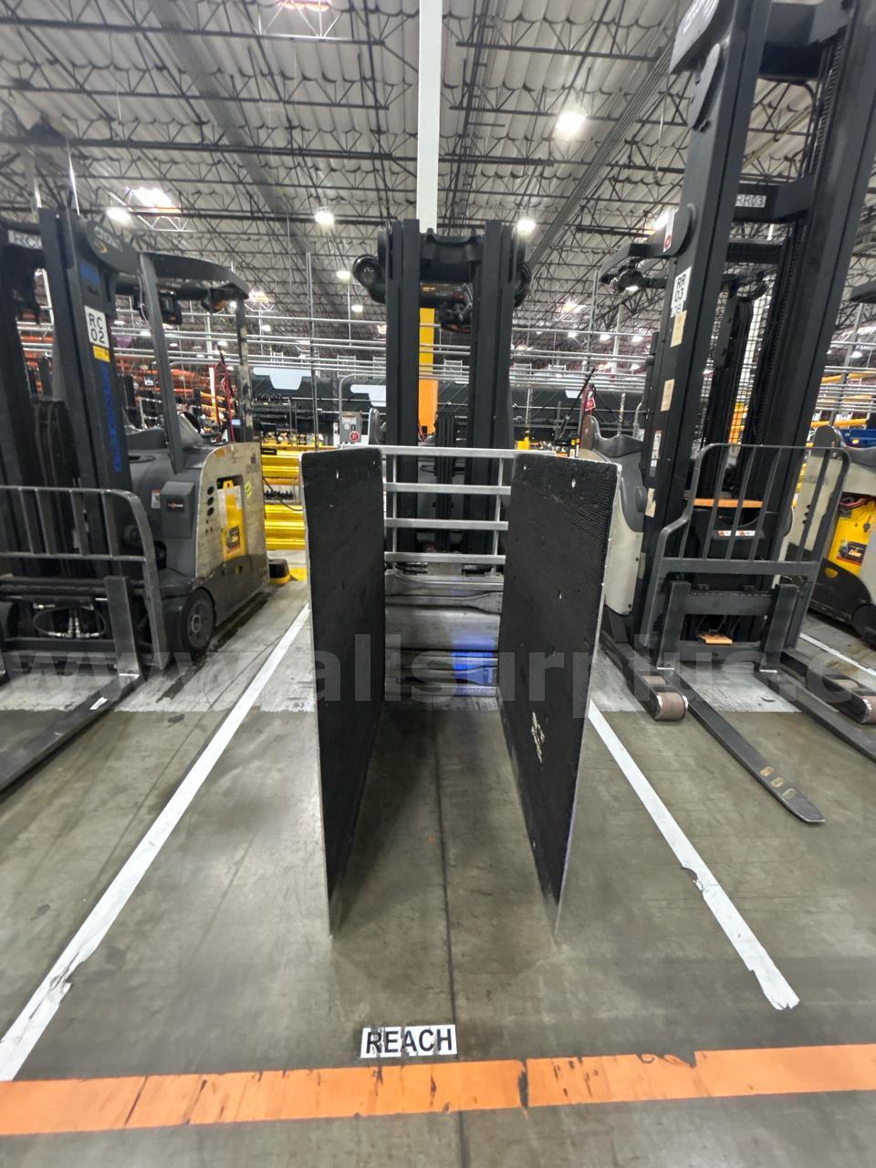 Crown RC 5500 Series Stand-Up Electric Forklift with Carton Clamp Crown 5500 Government Surplus Auction - Photo #3