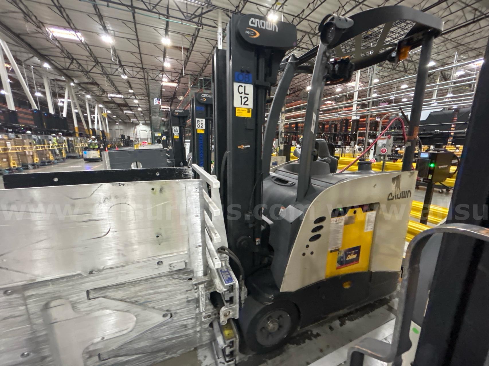Crown RC 5500 Series Stand-Up Electric Forklift with Carton Clamp Crown 5500 Government Surplus Auction - Photo #5